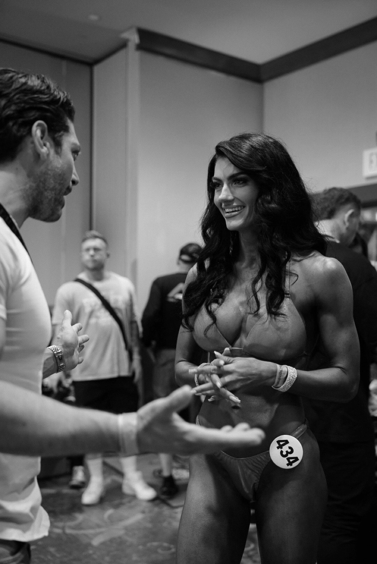 Sage Wagner backstage, talking with her coach before callouts